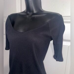 Express large slightly off the shoulders, tight fitted similar to body suit fit